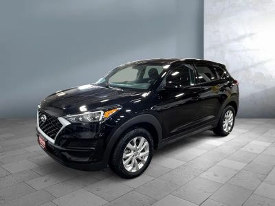 2019 Hyundai Tucson — front three-quarter view