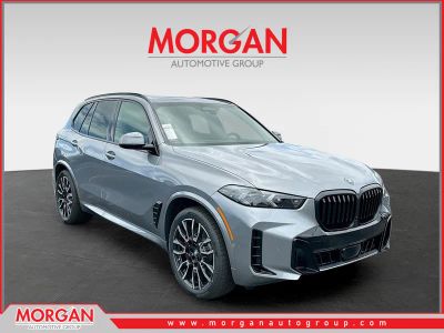 2026 BMW X5 xDrive50e in Gray — front three-quarter view
