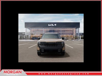2027 Kia Telluride X-Line EX in Terrain Brown — front three-quarter view