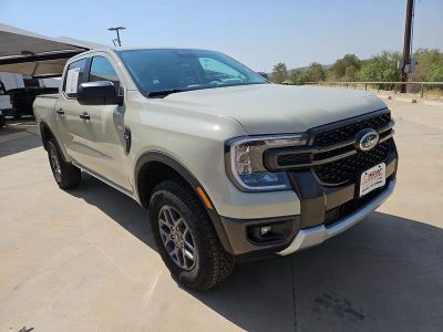 2025 Ford Ranger XLT in Desert Sand — front three-quarter view
