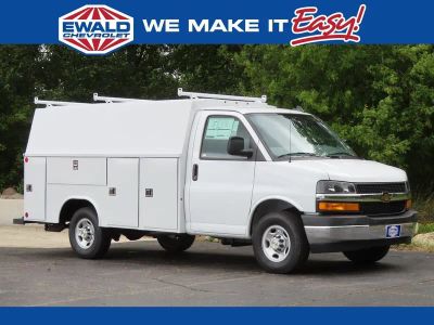 2025 Chevrolet Express 3500 READING 57" SRW, ALUMINUM ROOF CLASSIC SERVICE VAN Cutaway in Summit White — front three-quarter view