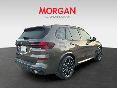2026 BMW X5 — rear three-quarter view