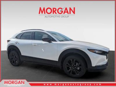 2026 Mazda CX-30 2.5 Turbo Premium Plus in Snowflake White Pearl Mica — front three-quarter view