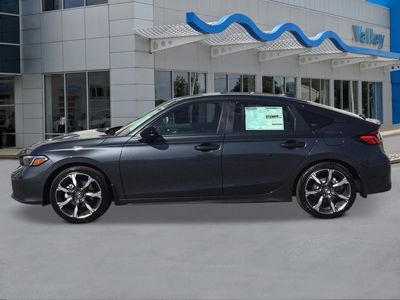 2026 Honda Civic Hatchback Hybrid — side profile view