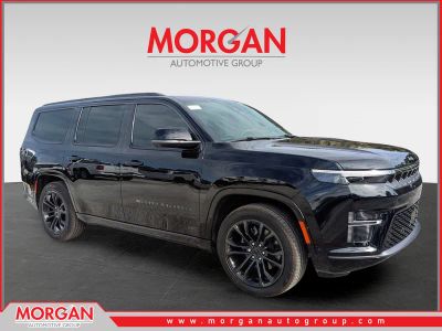 2026 Jeep Grand Wagoneer Summit Obsidian in Black — front three-quarter view