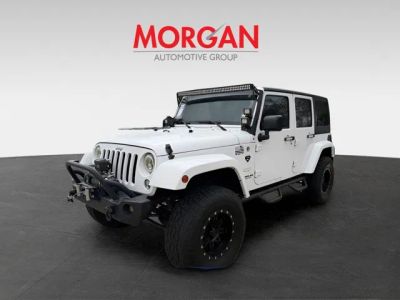 2015 Jeep Wrangler — rear three-quarter view