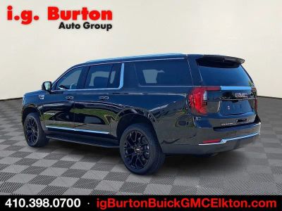 2026 GMC Yukon XL — rear three-quarter view