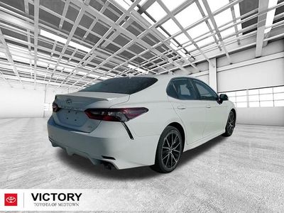 2023 Toyota Camry — rear three-quarter view