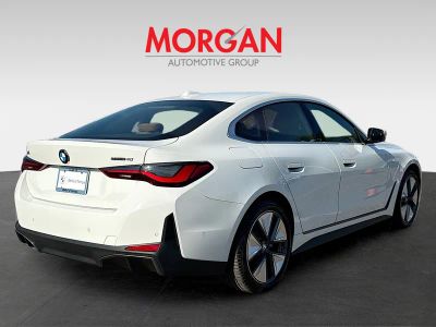 2026 BMW i4 — rear three-quarter view