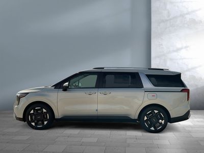 2026 Kia Carnival — rear three-quarter view