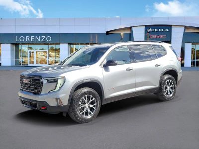 2024 GMC Acadia AT4 in Sterling Metallic — front three-quarter view