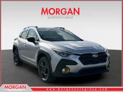 2026 Subaru Crosstrek Hybrid Sport in White — front three-quarter view