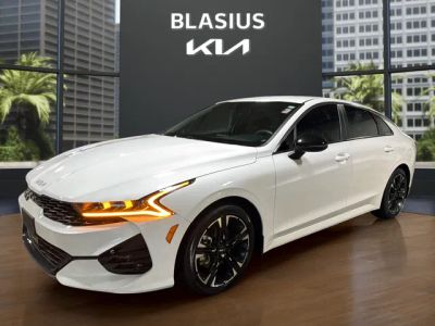 2024 Kia K5 GT-Line in Glacial White Pearl — front three-quarter view
