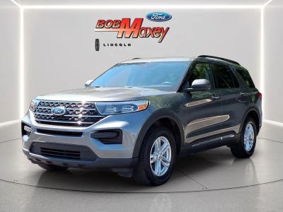 2023 Ford Explorer XLT in Gray Metallic — front three-quarter view