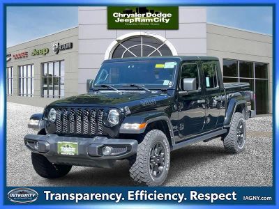 2022 Jeep Gladiator Willys 4x4 in Black Clearcoat — front three-quarter view