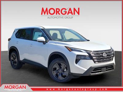 2026 Nissan Rogue SV in White — front three-quarter view