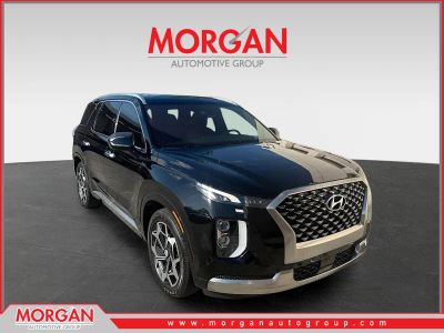 2022 Hyundai Palisade Calligraphy in Abyss Black Pearl — front three-quarter view