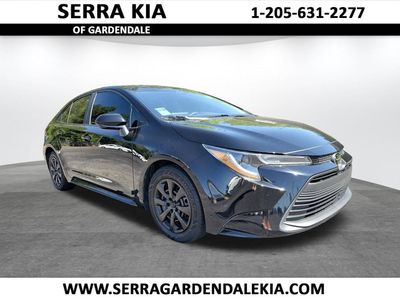 2024 Toyota Corolla LE in Midnight Black — front three-quarter view