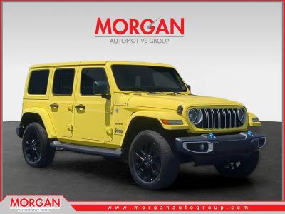 2024 Jeep Wrangler Sahara 4xe in Yellow — front three-quarter view