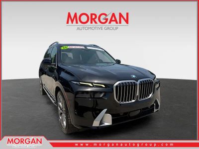 2023 BMW X7 xDrive40i in Black Sapphire Metallic — front three-quarter view