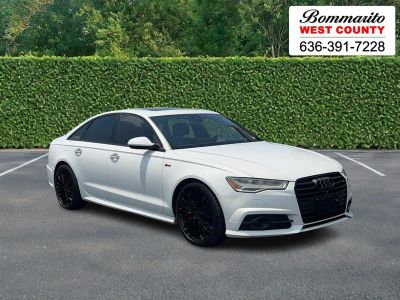 2018 Audi A6 3.0 TFSI Prestige quattro AWD in Glacier White — front three-quarter view