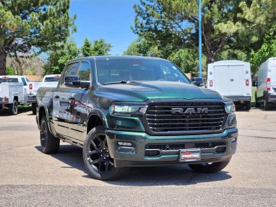 2026 RAM 1500 RAM 1500 LARAMIE CREW CAB 4X4 5'7' BOX in Serrano-Green Metallic Exterior Paint — front three-quarter view
