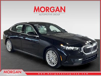 2025 BMW 5 Series 530i xDrive in Black — front three-quarter view