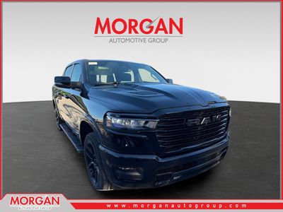 2026 Ram 1500 Laramie in Diamond Black Crystal Pearlcoat — front three-quarter view