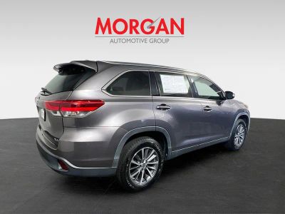 2019 Toyota Highlander — rear three-quarter view