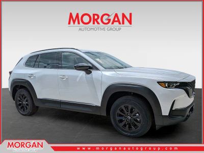 2026 Mazda CX-50 Hybrid Premium in Beige — front three-quarter view