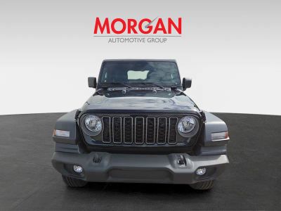 2026 Jeep Wrangler — rear three-quarter view