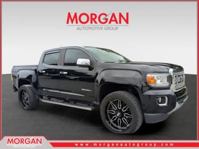 2020 GMC Canyon Denali in Black — front three-quarter view