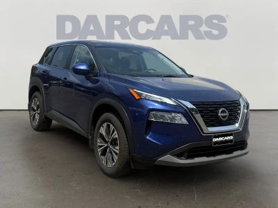 2023 Nissan Rogue SV in Caspian Blue Metallic — front three-quarter view