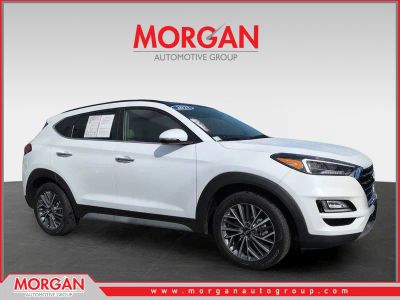 2021 Hyundai Tucson Ultimate in White — front three-quarter view