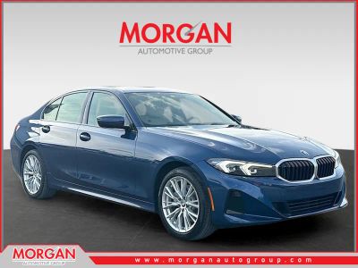 2023 BMW 3 Series 330i xDrive in Phytonic Blue Metallic — front three-quarter view