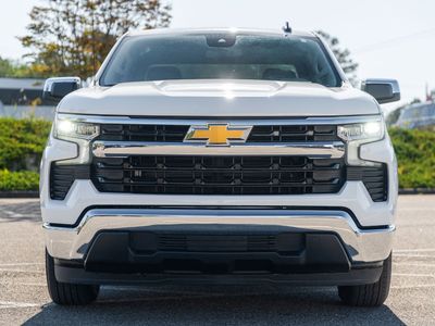 2025 Chevrolet Silverado 1500 LT in White — front three-quarter view