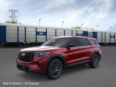 2026 Ford Explorer ST-Line in Rapid Red Metallic Tinted Clearcoat — front three-quarter view