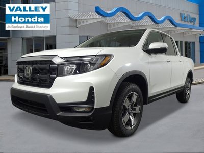 2026 Honda Ridgeline RTL in Platinum White Pearl — front three-quarter view