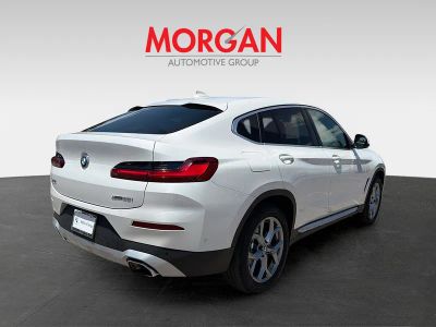 2025 BMW X4 — rear three-quarter view