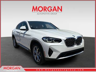 2025 BMW X4 xDrive30i in Mineral White Metallic — front three-quarter view