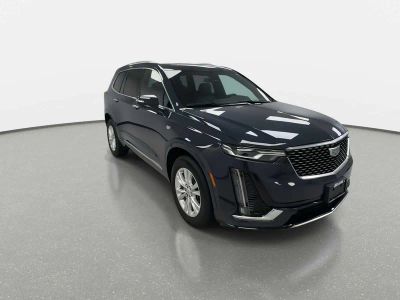 2024 Cadillac XT6 — rear three-quarter view