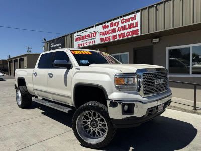 2014 GMC Sierra 1500 in White — front three-quarter view