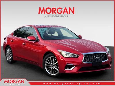 2023 INFINITI Q50 LUXE in Red — front three-quarter view