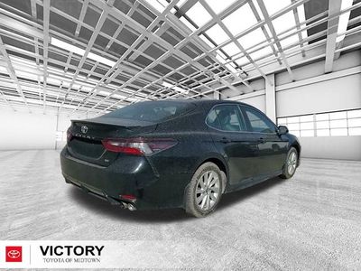 2024 Toyota Camry — rear three-quarter view