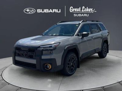 2026 Subaru OUTBACK Wilderness in River Rock Pearl — front three-quarter view