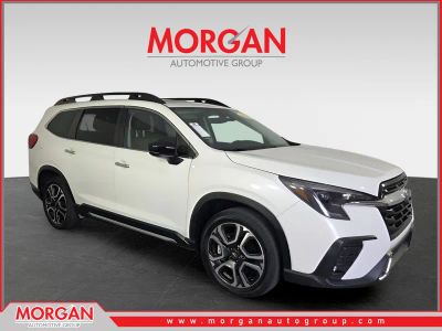 2024 Subaru Ascent Touring in White — front three-quarter view