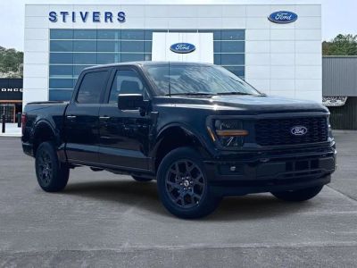 2026 Ford F-150 STX in Agate Black Metallic — front three-quarter view