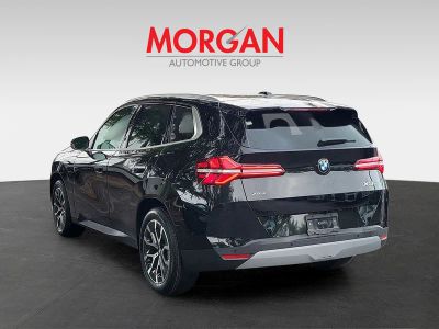 2026 BMW X3 — rear three-quarter view