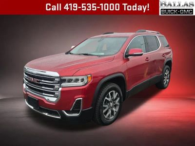 2023 GMC Acadia SLE in Volcanic Red Tintcoat — front three-quarter view