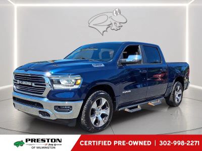 2023 RAM 1500 Laramie in Patriot Blue Pearlcoat — front three-quarter view